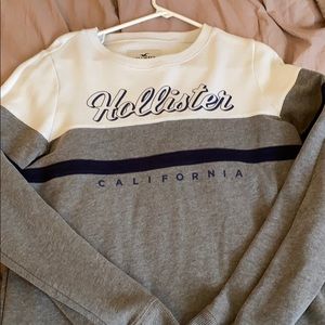 Grey, white, and Blue Hollister sweatshirt